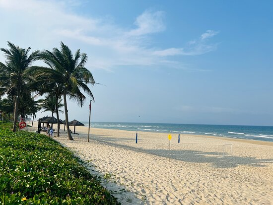 Non Nuoc Beach near The Point Da Nang Villa with white sand.